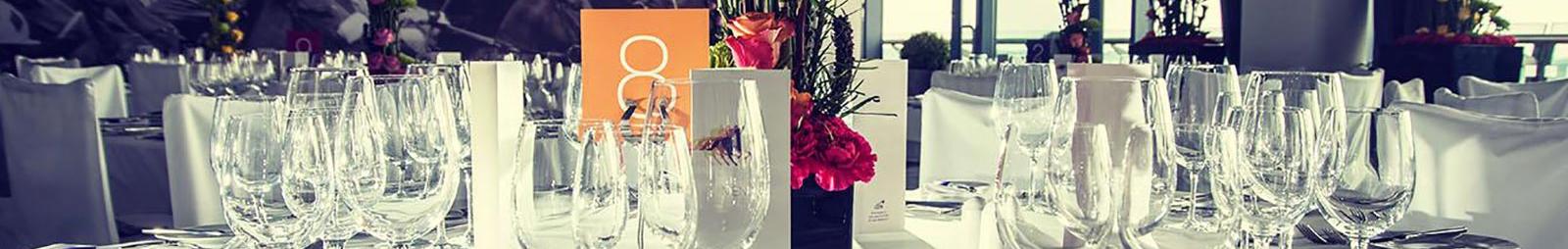 A table set with empty win glasses at Doncaster Racecourse
